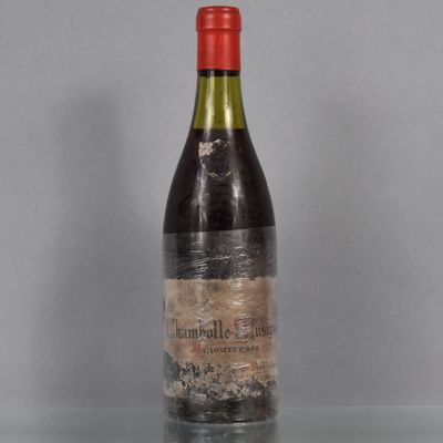 a bottle of wine that is sitting on a table