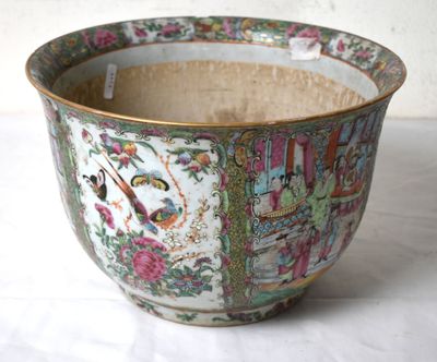 a large bowl with a design on it sitting on a table