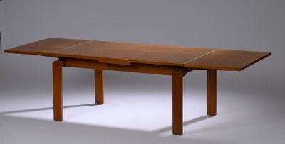 a table that has a wooden top and legs on it