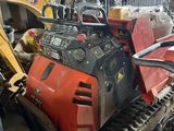 a picture of a machine that is sitting in a garage