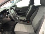 the interior of a car with a steering wheel and a dashboard