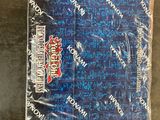 a close up of a package of blue candy wrappers on a table