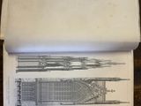 a piece of paper that has a drawing of a building on it