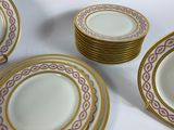 a lot of plates that are sitting on a table