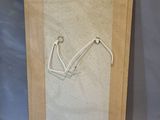 an image of a picture of a pair of scissors on a piece of paper