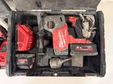 a tool box with tools in it on a table