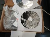 a box with a lot of cds in it on a desk