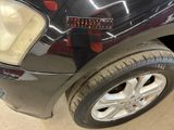 a picture of a car with a sticker on the front of it