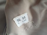 a person holding a bag that has a label on it