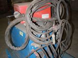 a blue pallet with a bunch of hoses on top of it