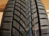 a close up of a tire on a wooden surface