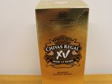 bottles of chivas regal on a wooden table with a white background