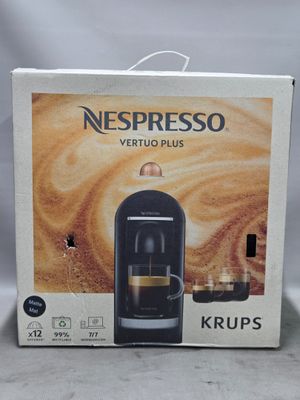 un carton de machines à café Nespresso Vertuo Plus