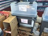 many boxes of food on the pallets in the store