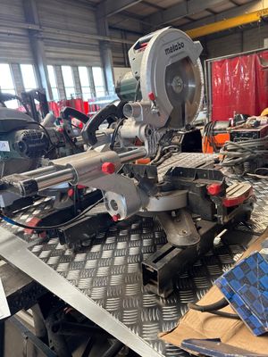 a picture of a machine in a workshop with tools