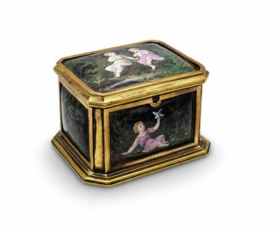 une petite boîte avec un tableau sur une surface blanche