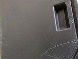 an image of a trash can lid with a hole in it