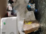 a box with a laptop and other items inside of it