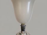 an image of a lamp with a glass shade on top of it