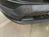 a close up of the front bumper of a car
