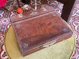 a small wooden box sitting on top of a table
