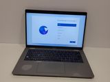 a laptop that is sitting on a table