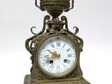 a clock that is sitting on top of a table