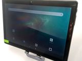 someone is holding up a tablet with a screen on top of it