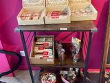 many boxes of food on a table in a room