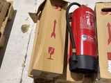 two boxes of fire extinguisors sitting on a pallet