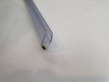 a clear plastic tube on a white surface