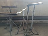two stands that are standing in a room