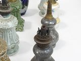 many different vases that are sitting on a table