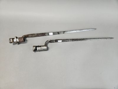 two tools that are sitting on a table