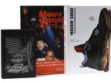 two books on a white background with a picture of a man ' s shoe