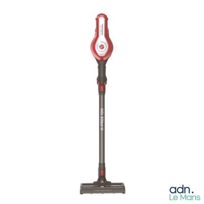 a close up of a red and black vacuum on a white background