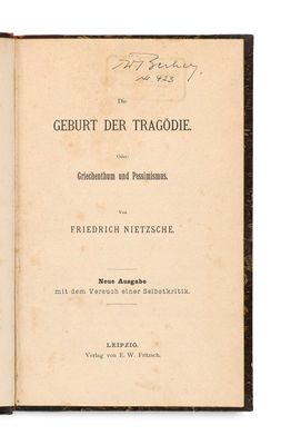 un livre ouvert sur lequel figure la photo d'un homme