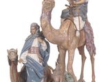figurine of the three wise men on camels with jesus and mary