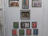 a picture of a collection of stamps on display in a box