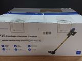 the box of a cordless vacuum cleaner sits on a table