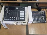 a table with a bunch of electronic equipment on top of it