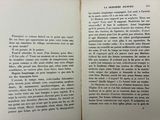 an open book with a black and white image of a man ' s face on it