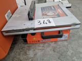 a table that has a laptop on top of it