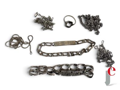 a lot of metal items that are on a white surface