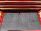 an image of a red tool box with a red handle