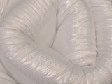 a white inflatable chair that is sitting on the floor