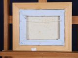 a picture of an empty picture frame on a easel