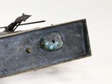 sculpture of a mouse on a box with a mouse on top of it