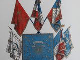 five flags that are hanging on the wall