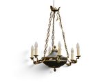 une image représentant un lustre auquel sont suspendues cinq bougies